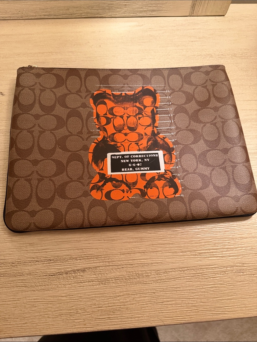 Coach Brown Signature Canvas Pouch with Orange Bear Motif